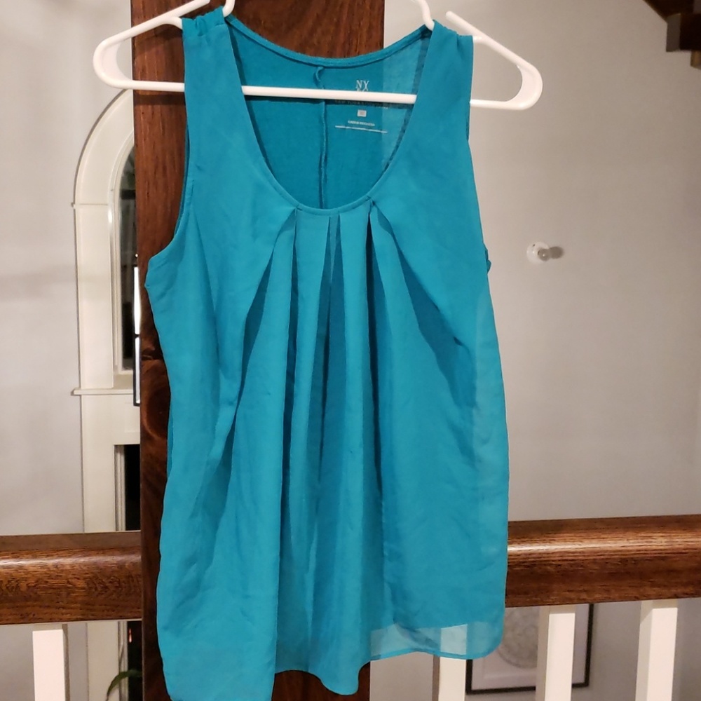 Teal flowt tank